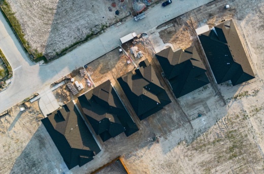 An overhead view of a row of new homes.