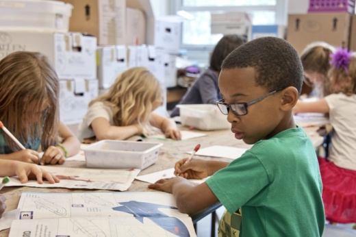 Students complete work at an elementary school.