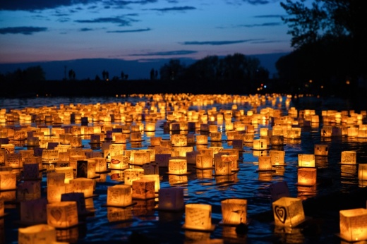 Lanterns float on a lake