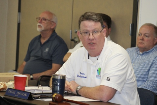 Picture of Highland Villager mayor at a meeting