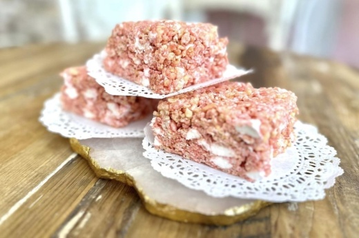 pink treats on a tiered platter