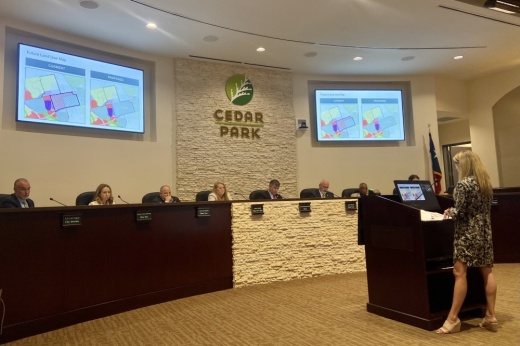 A woman presents at a Cedar Park City Council meeting