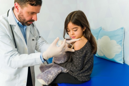 Child receiving vaccine