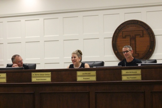 The photo shows Tomball ISD's school board and superintendent.