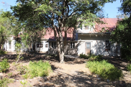 historic home surrounded by trees