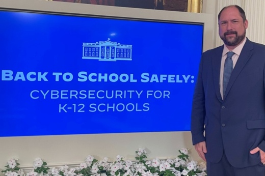 Kyle Berger, Grapevine-Colleyville ISD's chief technology officer, poses in the White House during the cybersecurity summit.