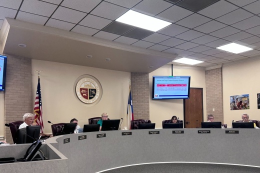 Tomball City Council members sit at the dais at Tomball City Hall