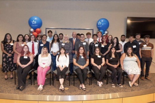 Representatives of Silver Eagle Beverages appear with college students who received a scholarship from the company in an Aug. 8 presentation at the company’s San Antonio office. (Courtesy Silver Eagle Beverages)