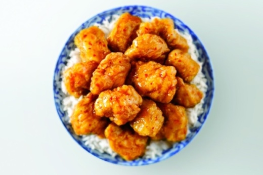 bowl of orange chicken with rice