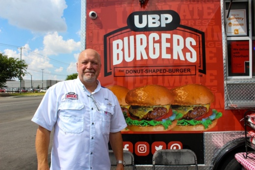 John Evans in front of the food truck