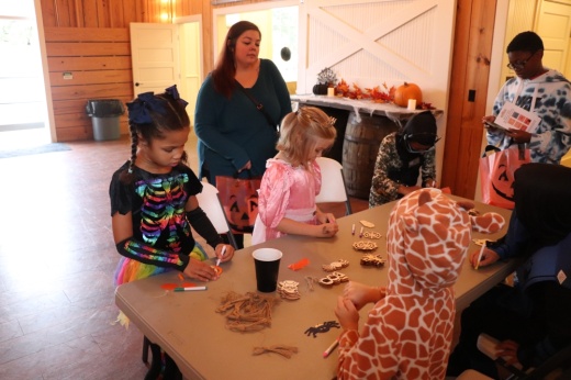 Children working on arts and crafts activities.