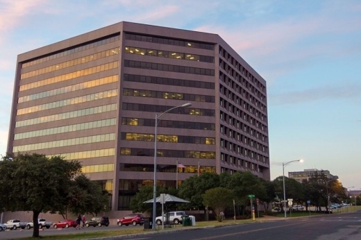 exterior building with pink clouds above