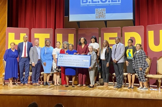 Huston-Tillotson University and Blue Cross and Blue Shield of Texas officials announced the new program Sept. 14 alongside Texas Rep. Sheryl Cole and Kelenne Blake, the executive director of Black Mamas ATX. (Chloe Young/Community Impact).