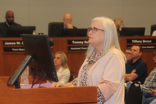 Picture of a Flower Mound town official at a council meeting