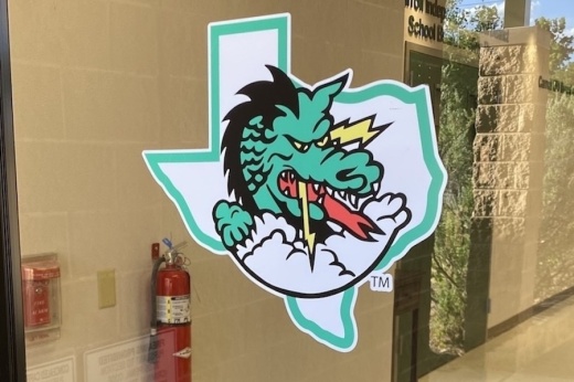 Photo of Carroll ISD logo on a window