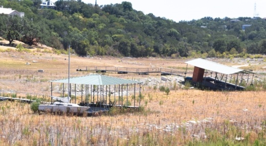 Boat docks at Hurst Creek Cove sit on dry land as Lake Travis hit 37.8% fill capacity Sept. 8. (April Kelley/Community Impact)