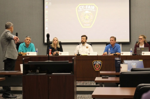 Harris County Emergency Services District No. 9 commissioners receive a report from Stewart Gary, the public safety principal for Citygate Associates. (Danica Lloyd/Community Impact)