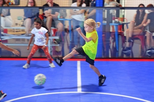 children playing soccer