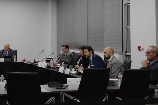 Council members deliberate changes to the city's administrative code.