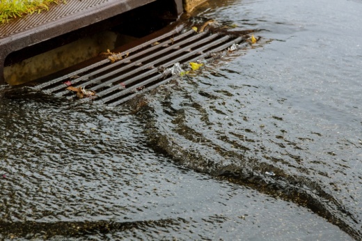 Water runs into a stormwater drain