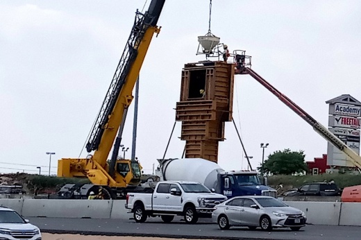 Contractors work on a pillar on Loop 1604 near Northwest Military Highway as part of ongoing expansion of the highway. The state's new 10-year road construction plan supports four current and planned road projects in North San Antonio. (Edmond Ortiz/Community Impact)