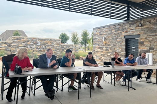 McKinney MUD No. 1 board members outside sitting at a table