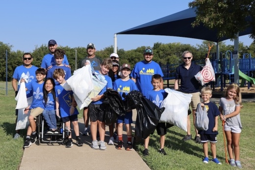 Picture of people volunteering for a community recycling event.