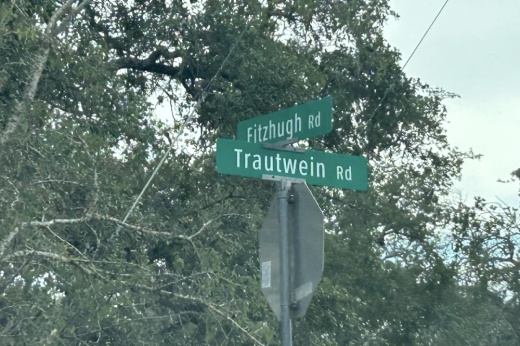 Road signs for the intersection of  Fitzhugh Road and Trautwein Road.