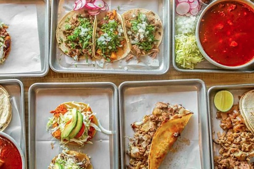 A table filled with Mexican food.