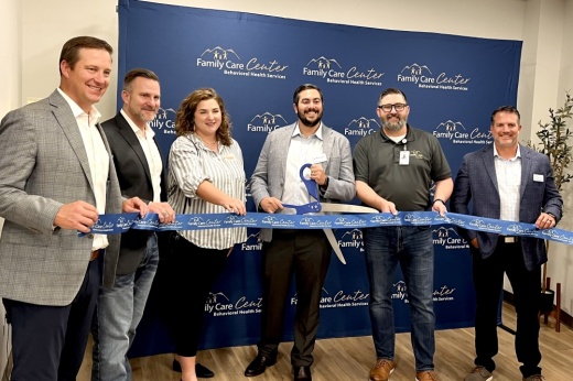 Dr. Alexander Kaplan cuts the ribbon at the grand opening of Family Care Center in Pflugerville.