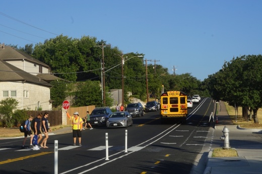 students crossing a cross walk