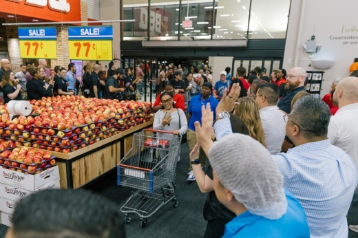 Shoppers walk into an H-E-B store in Allen