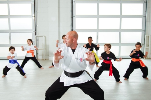 Co-owner Cory Gilbert leads a kids class in Kung Fu instruction.