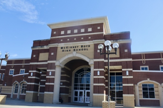 a brick front entrance of a high school