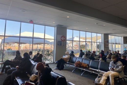 Passengers wait for their flights at the South Terminal at the Austin-Bergstrom International Airport.
