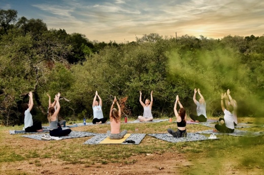 women doing yoga outdoors