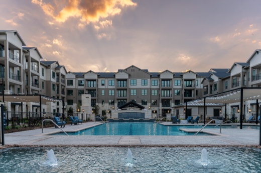 Central view of swimming pool and apartment units in Caldwell's new community Cadence Creek.
