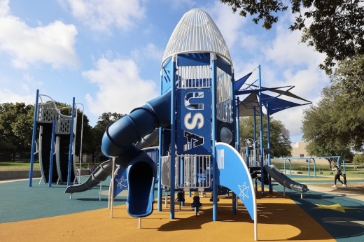 Picture of new playground equipment at a town park.