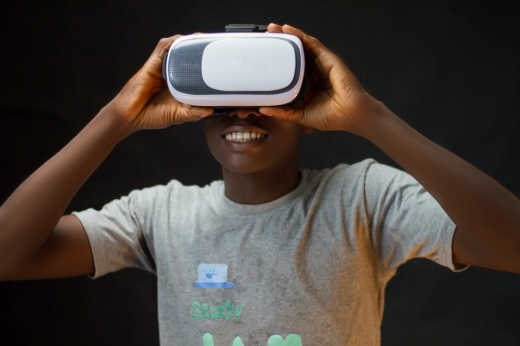 Player holds virtual reality gaming mask