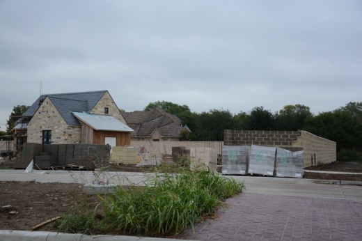 Construction of a model home and exterior features for Blackberry Farms