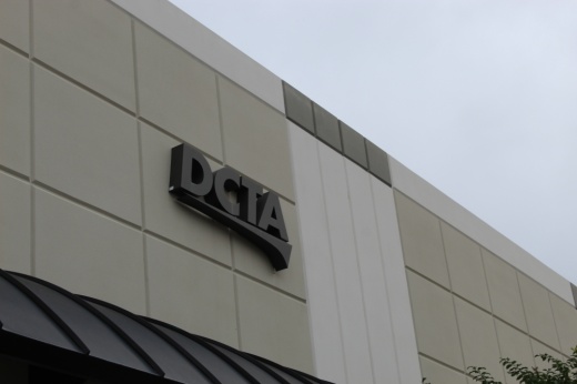 The Denton County Transportation Authority logo displayed at the agency's administration office located at 1955 Lakeway Drive, Ste. 260, Lewisville.