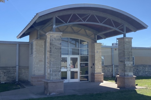 The face of a building called the Leander Extended Opportunity Center.