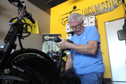 Owner Dave Belanger preforms a repair.