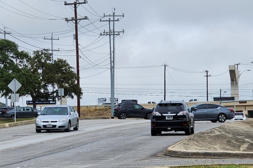 Vehicles on a road.