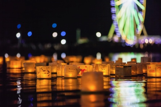 The photo shows water lanterns at night.
