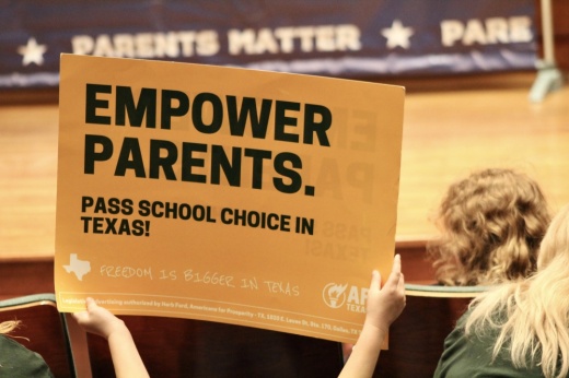 A student holds up a sign at a rally for education savings account Oct. 16 at the Texas Capitol.