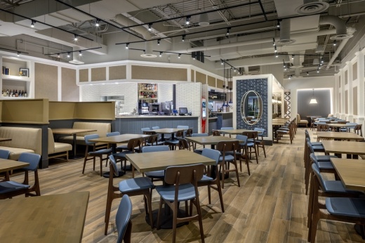 tables in booths of a restaurant interior