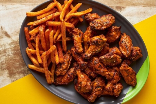 close up of chicken and fries