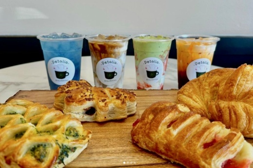 pastries in the foreground with colorful drinks in the background