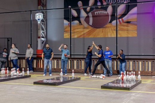 Players enjoy a game of fowling in Plano